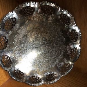 Shallow antique bowl plate. Beautiful scroll work